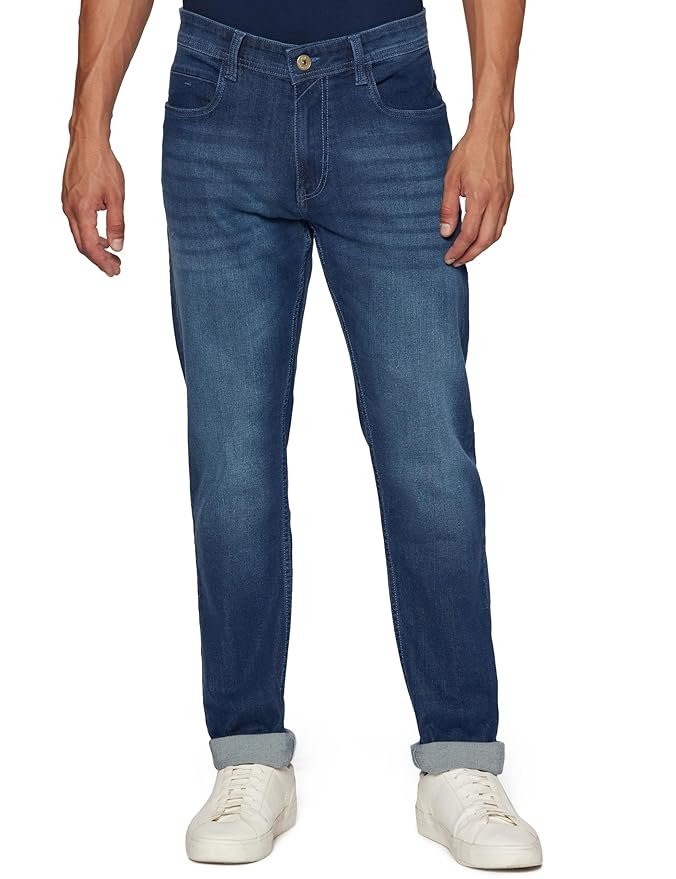 Peter England men’s tapered fit mid‑rise jeans in stretchable twill fabric, classic tape detail, stylish design, and comfortable wear for modern fashion.