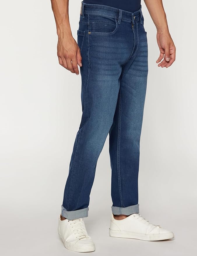 Men’s tapered fit jeans by Peter England, crafted in durable twill fabric with stretch comfort and mid‑rise waist for everyday wear.