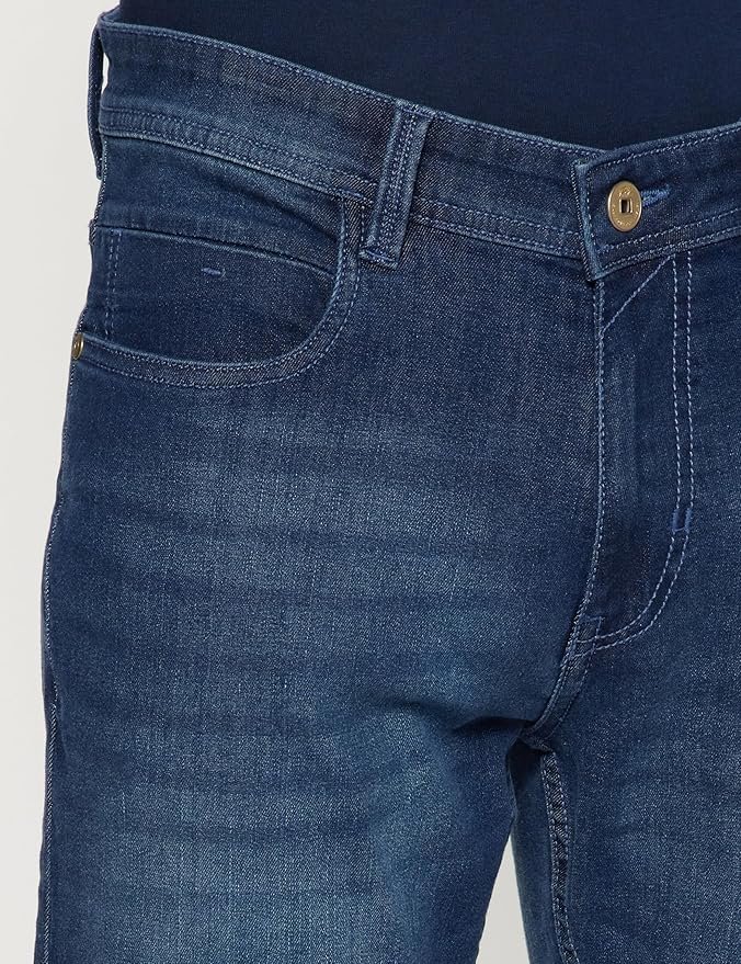 Peter England classic tape jeans with tapered fit, mid‑rise waist, and stretchable twill fabric, offering style and comfort.