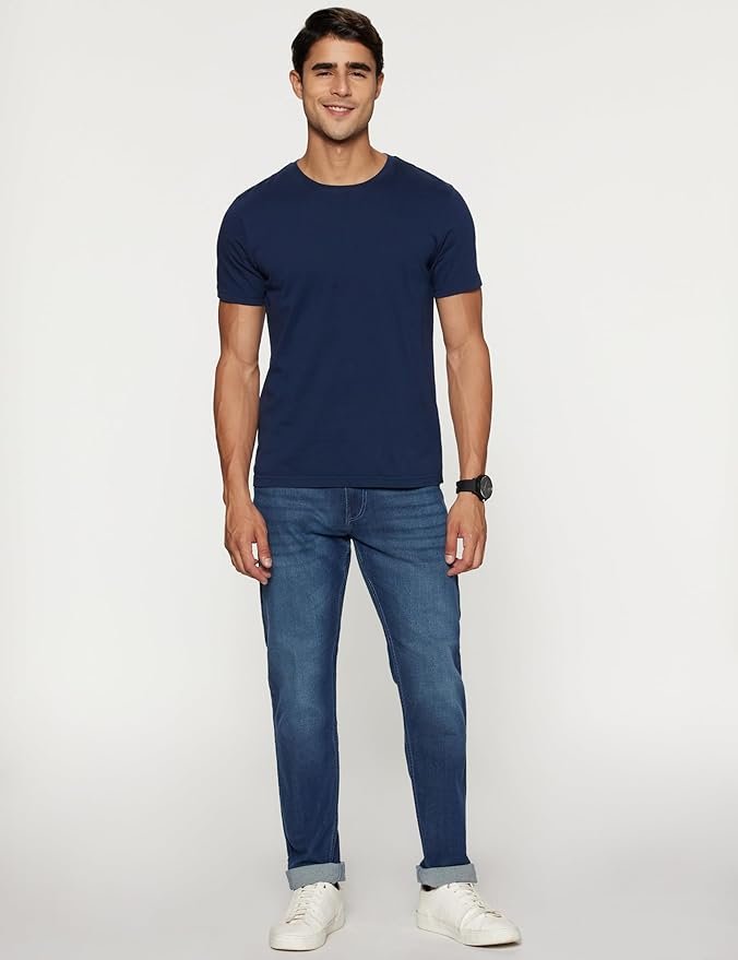 Peter England tapered fit jeans featuring classic tape detail, mid‑rise waist, and stretchable twill fabric for modern men’s style.