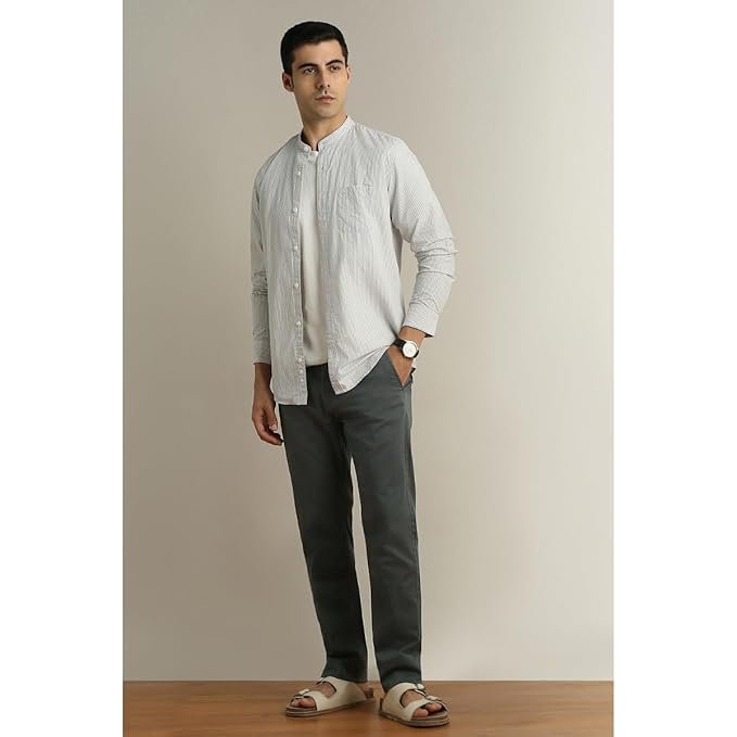Stylish Peter England slim fit trousers, cotton satin blend, stretchable comfort, timeless design, ideal for men’s office and casual wear.